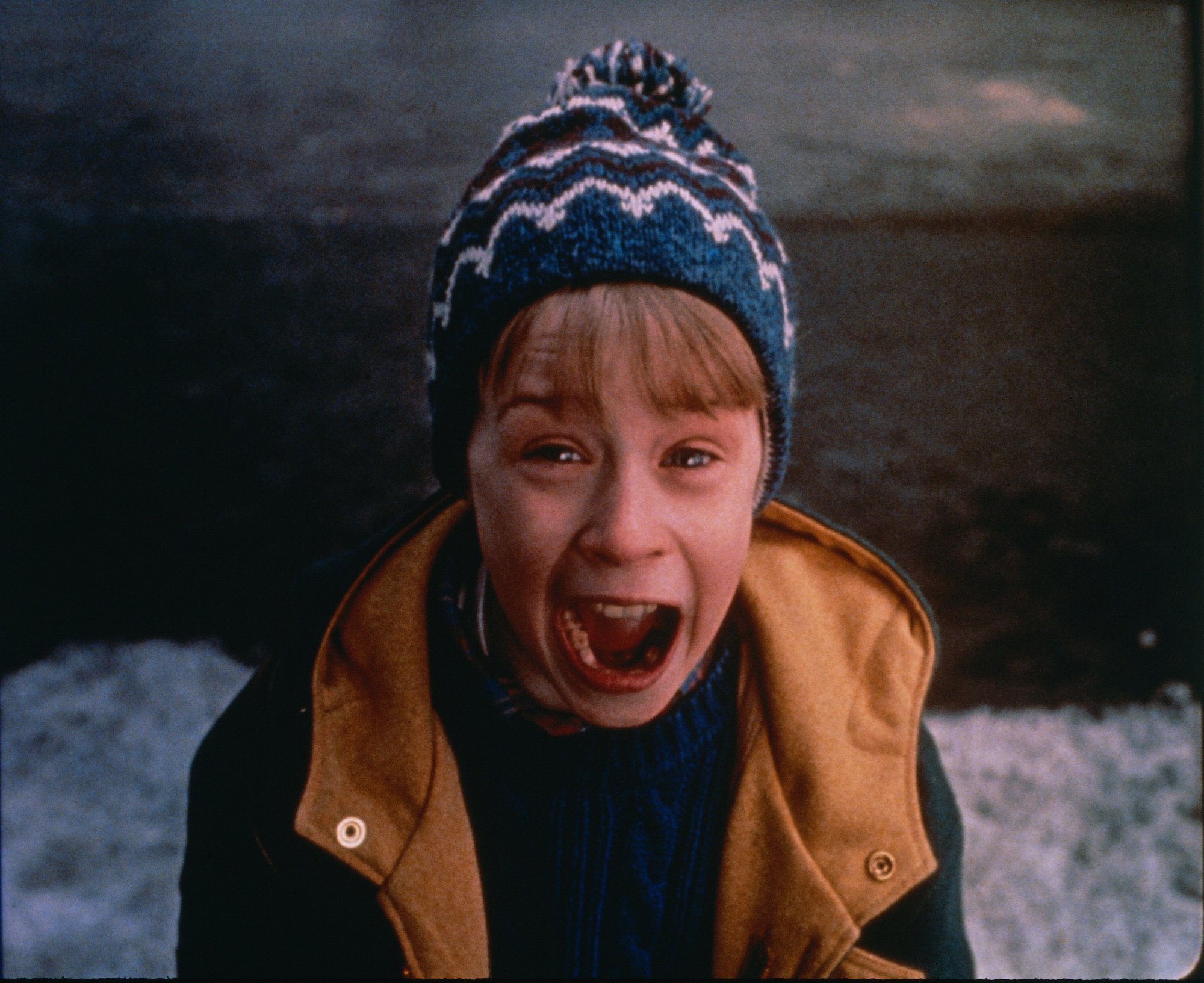 'Home Alone 2: Lost in New York' Macaulay Culkin as Kevin screaming with snow in the background