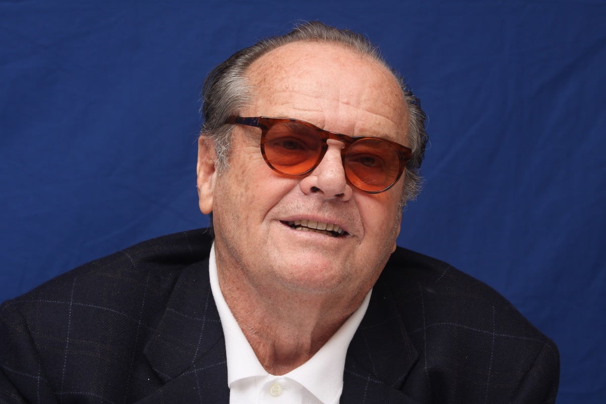 Jack Nicholson smirking while wearing shades.