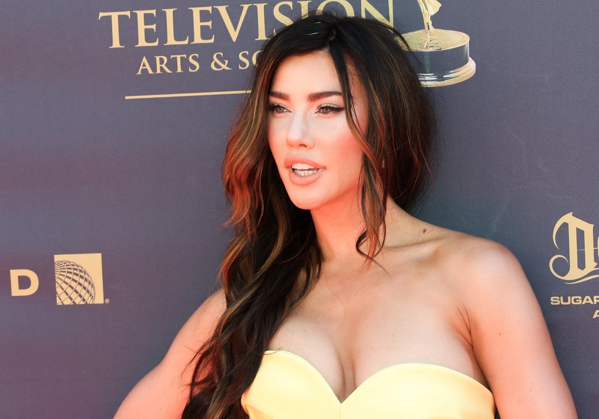 'The Bold and the Beautiful' actor Jacqueline MacInnes Wood wearing a yellow dress and walking the red carpet.