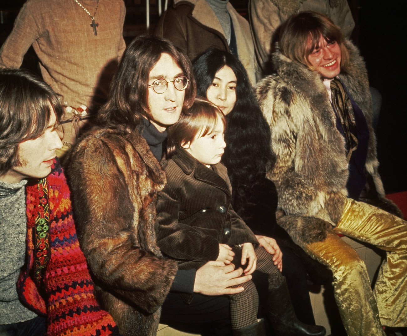 John Lennon, his son, Julian Lennon, and Yoko Ono at a press conference for The Rolling Stones' 'Rock & Roll Circus' in 1968. 