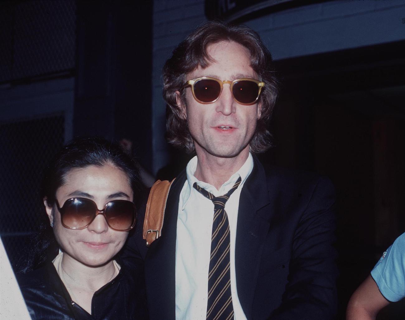 John Lennon and Yoko Ono wearing sunglasses in New York, 1980.