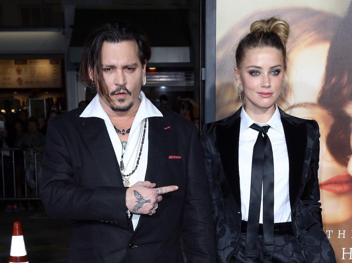 Johnny Depp and Amber Heard pose together at an event.