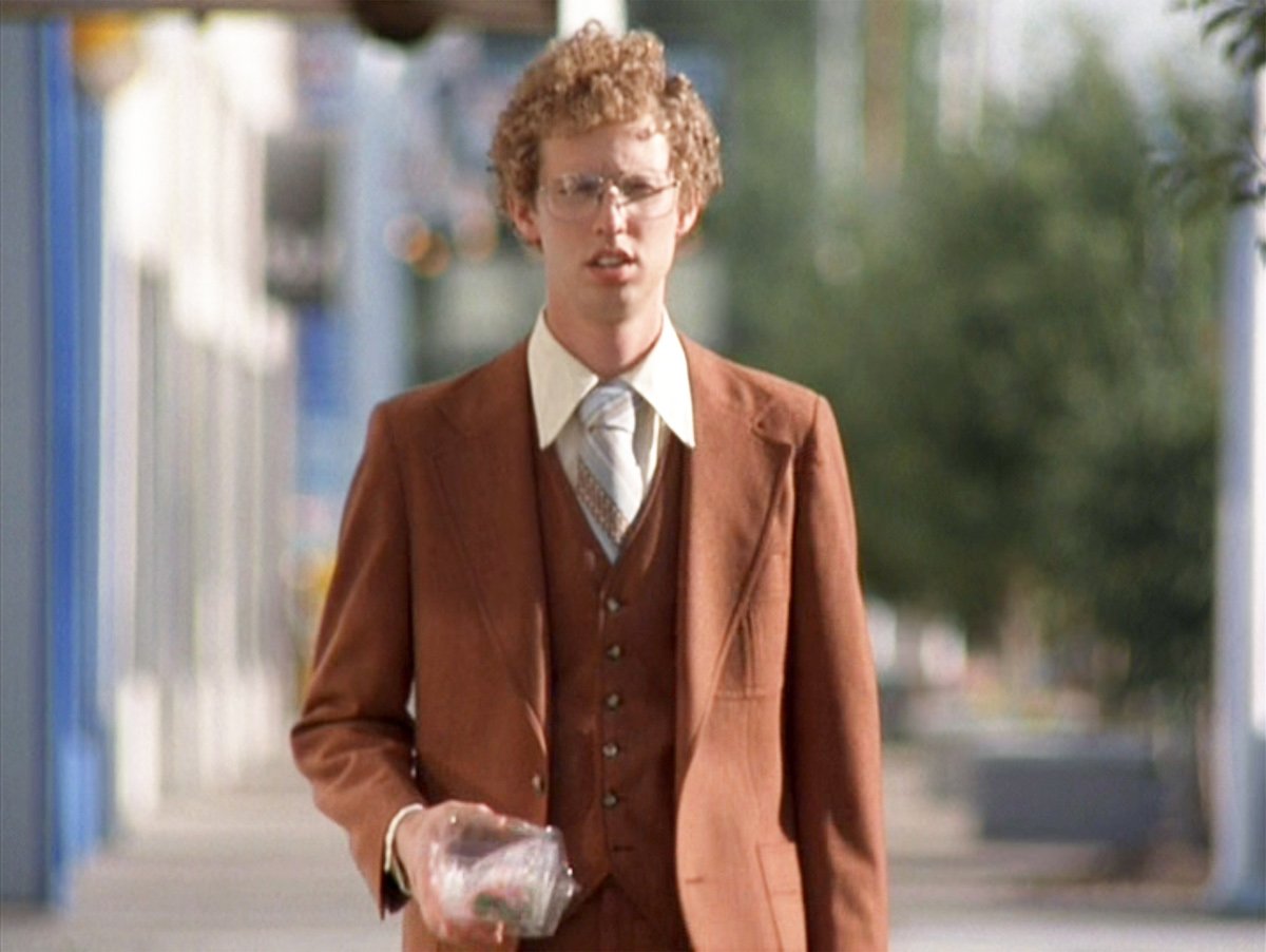 Jon Heder in a brown suit in 'Napoleon Dynamite