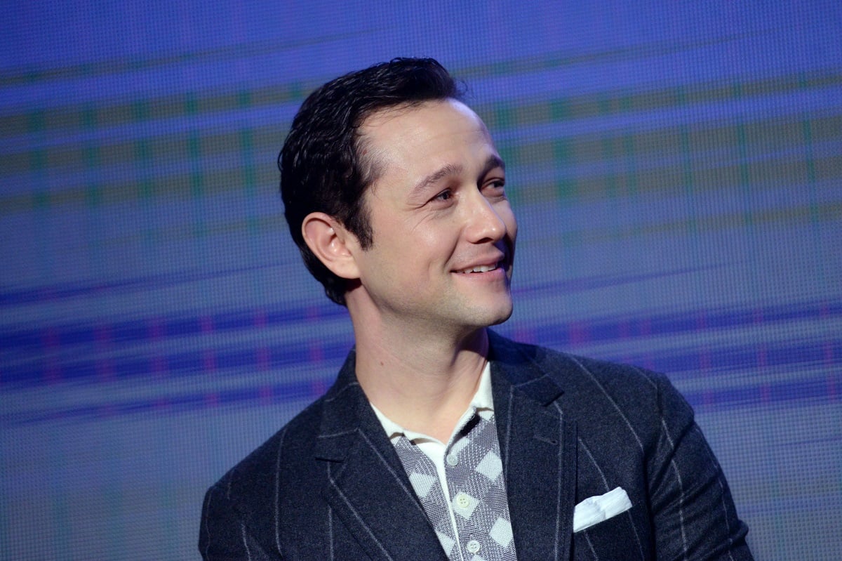 Joseph Gordon-Levitt smiling while wearing a suit