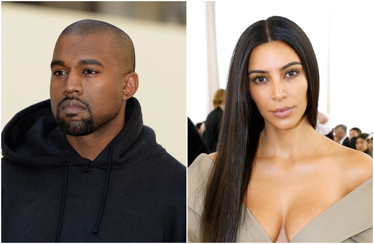 Kanye West in a black hoodie, Kim Kardashian wearing a low-cut gray dress