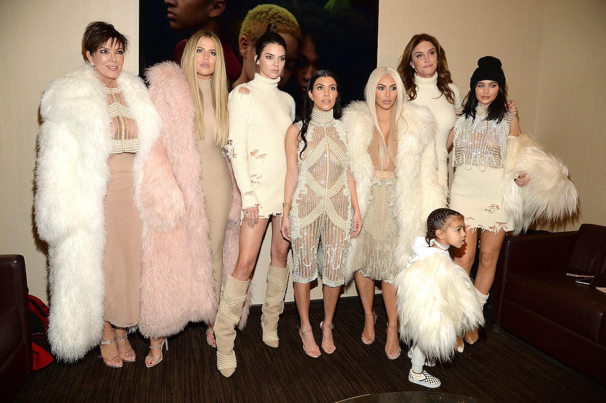 Khloé Kardashian, Kris Jenner, Kendall Jenner, Kourtney Kardashian, Kim Kardashian West, North West, Caitlyn Jenner, and Kylie Jenner attend Kanye West Yeezy Season 3 at Madison Square Garden on February 11, 2016, in New York City