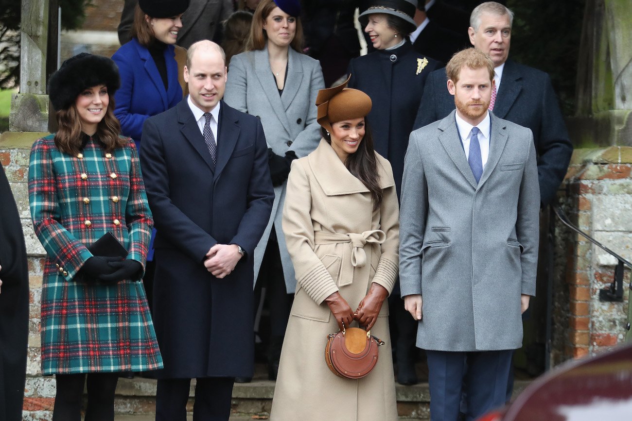 Kate Middleton, Prince William, Meghan Markle, and Prince Harry stand next to each other at church on Christmas Day in 2017
