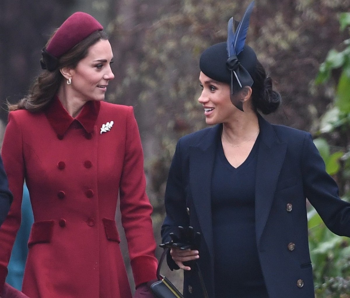 Kate Middleton and Meghan Markle walking to the Christmas Day morning church service