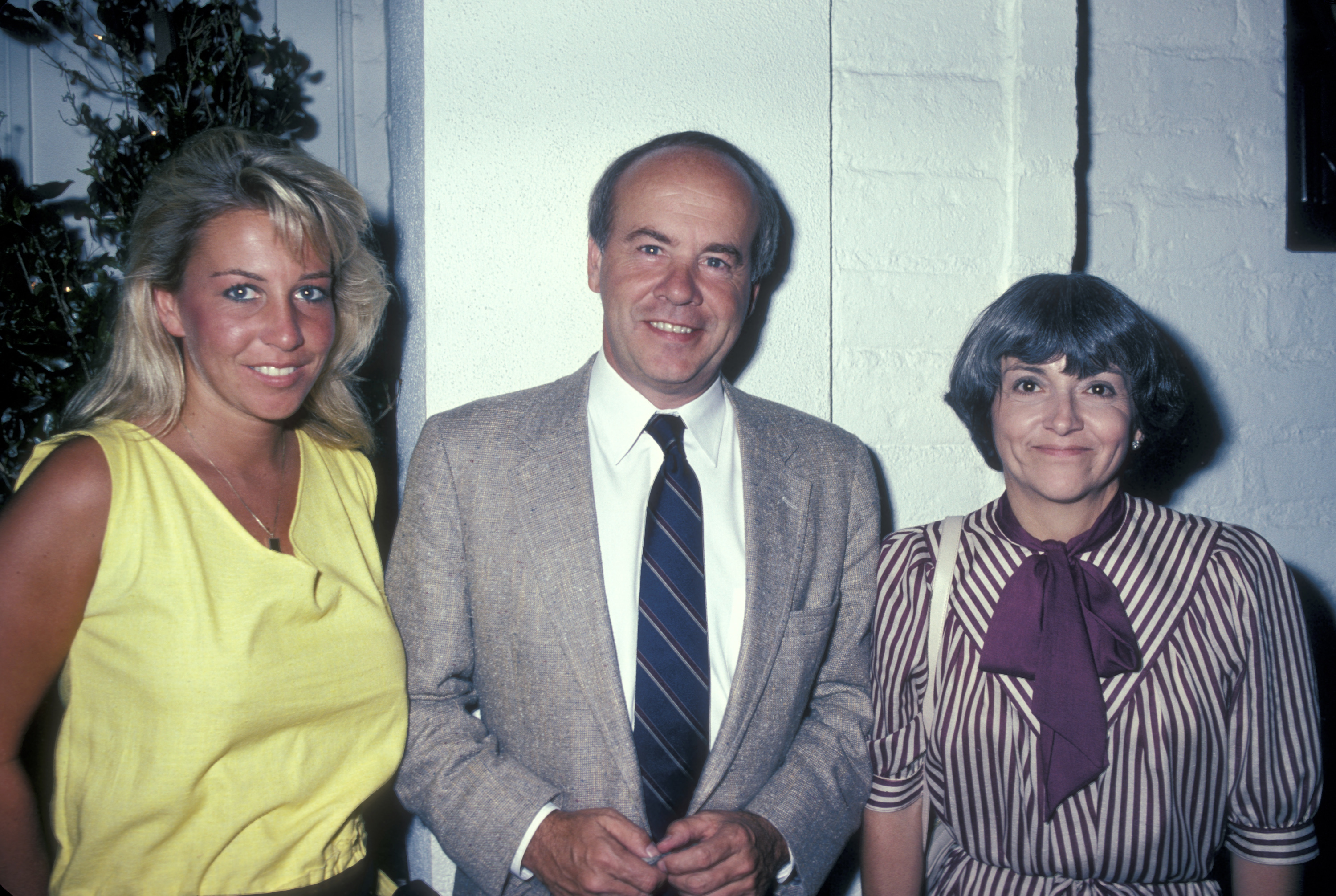 Kelly Conway with her father Tim Conway, and his wife Charlene being photographed on August 9, 1983 at Chasen's Restaurant in Beverly Hills, California