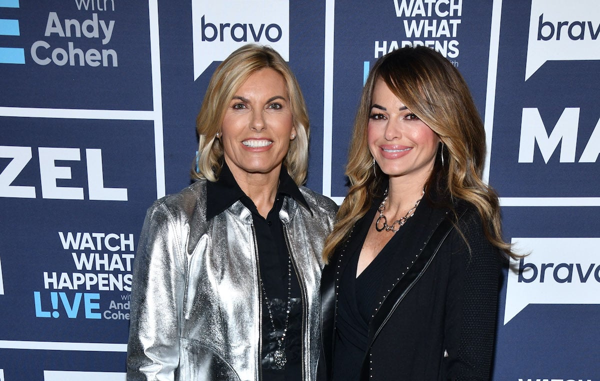 (L-R) Sandy Yawn and Leah Shafer smiling in front of a blue background
