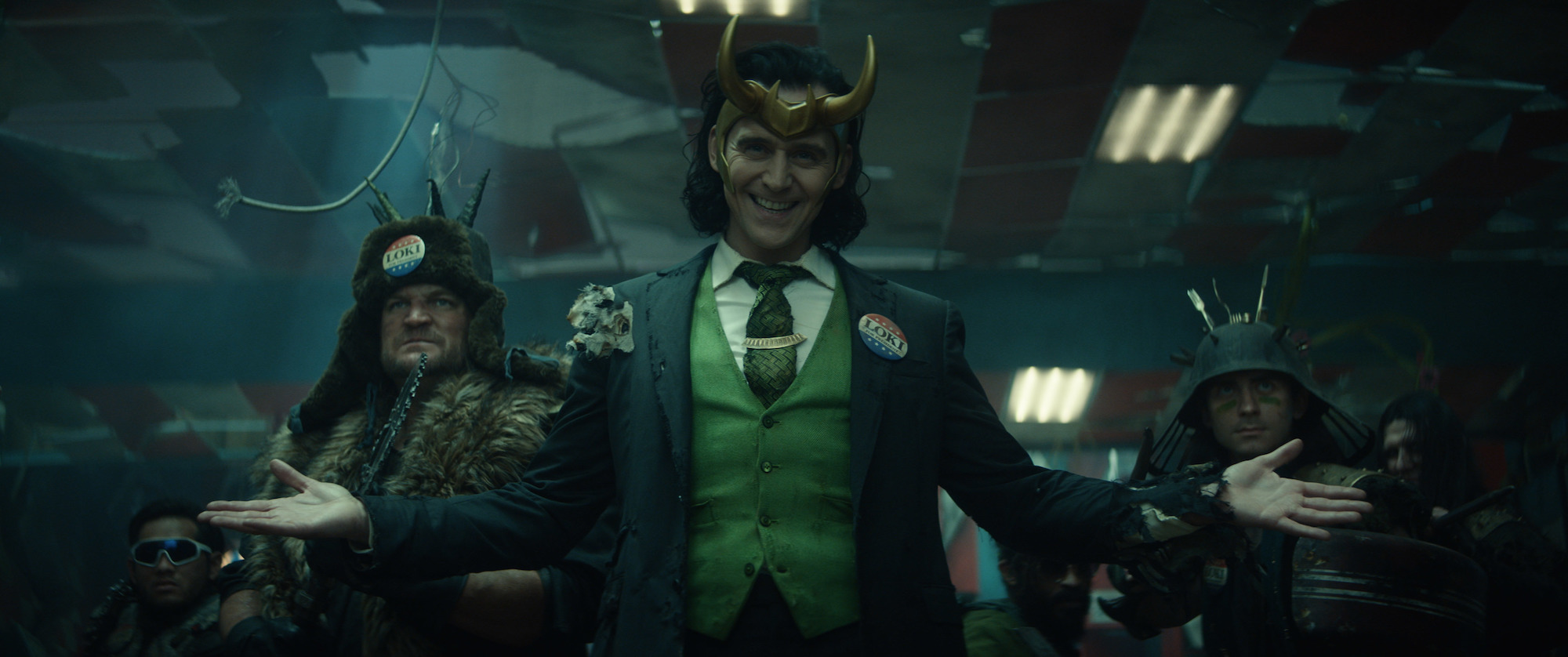 Tom Hiddleston wearing giant horns as Loki in a scene from 'Loki' Season 1