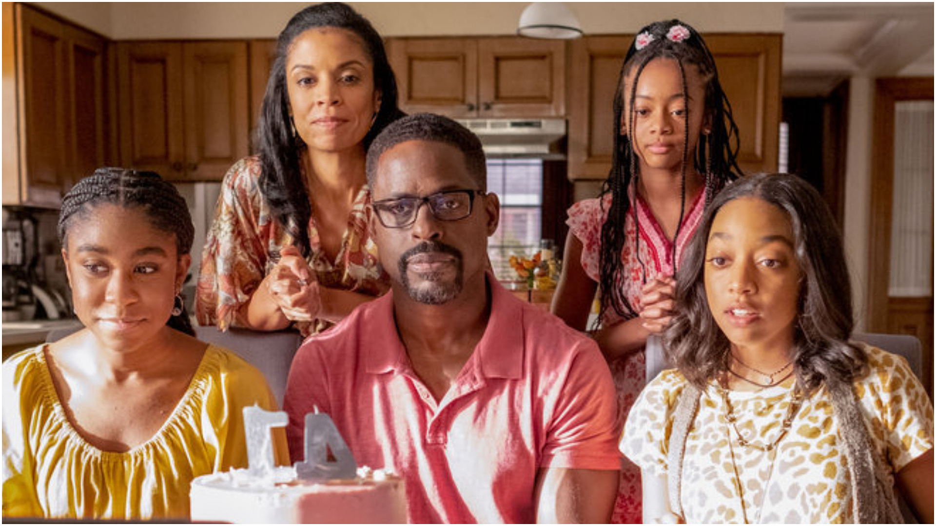 Lyric Ross as Deja, Susan Kelechi Watson as Beth, Sterling K. Brown as Randall, Eris Baker as Tess, Faithe Herman as Annie sit together on the Big Three’s birthday in the ‘This Is Us’ Season 6 premiere