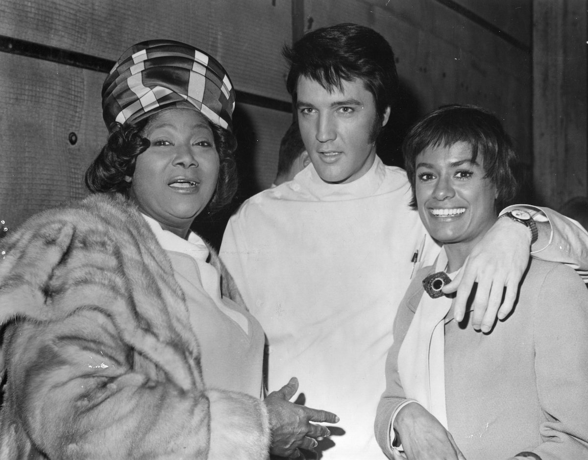 Singers Mahalia Jackson, Elvis Presley, and Barbara McNair take a photo together in 1969