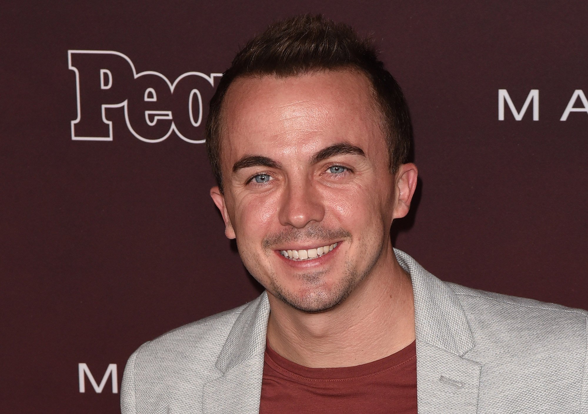 'Malcolm in the Middle' star Frankie Muniz smiles on the red carpet in 2017