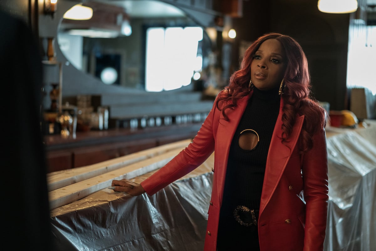 Mary J. Blige as Monet Tejada wearing a red jacket in 'Power Book II: Ghost'