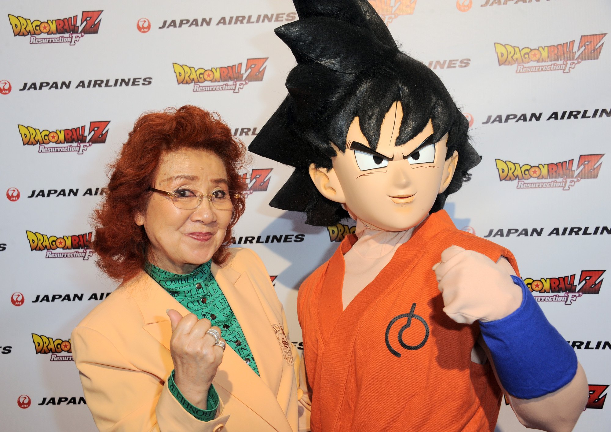 Gohan voice actor Masako Nozawa and someone dressed as Goku.