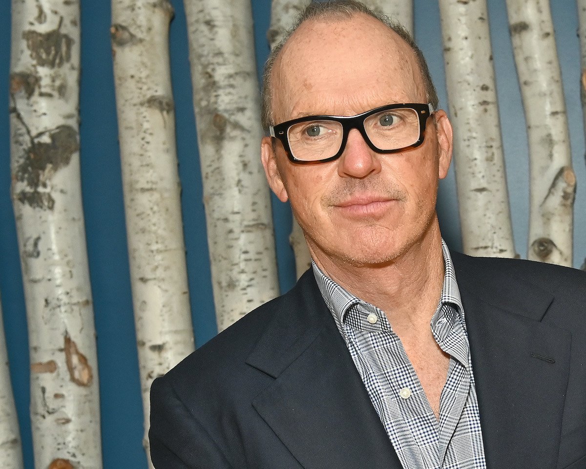 Michael Keaton in a suit and glasses at the ‘Dopesick’ premiere