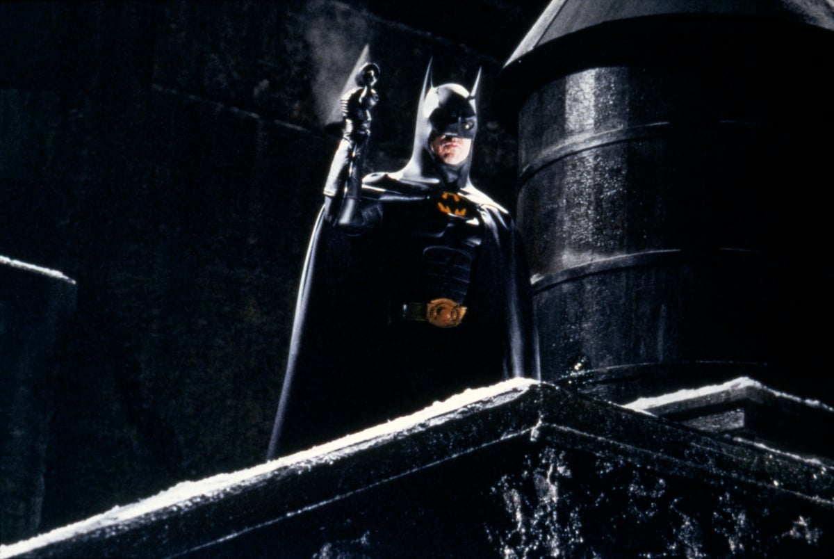 Michael Keaton as Batman holds a grappling hook in ‘Batman Returns’