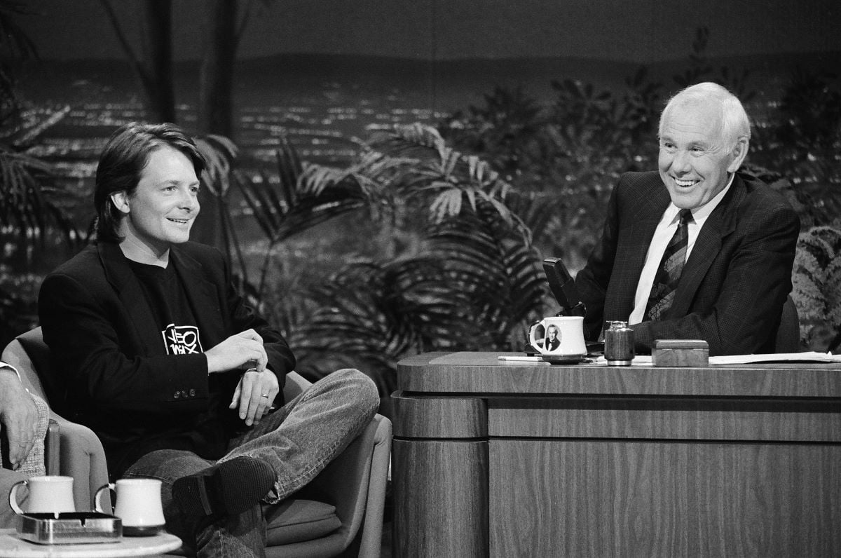 Michael J. Fox sits during a 1991 interview with Johnny Carson