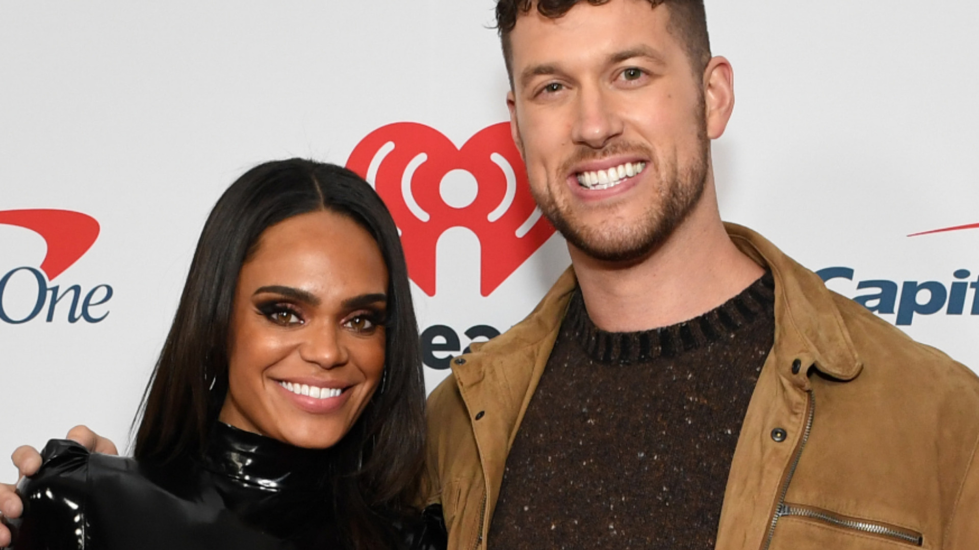 ‘The Bachelorette’ and ‘The Bachelor’ stars Michelle Young and Clayton Echard pose together at Jingle Ball 2021