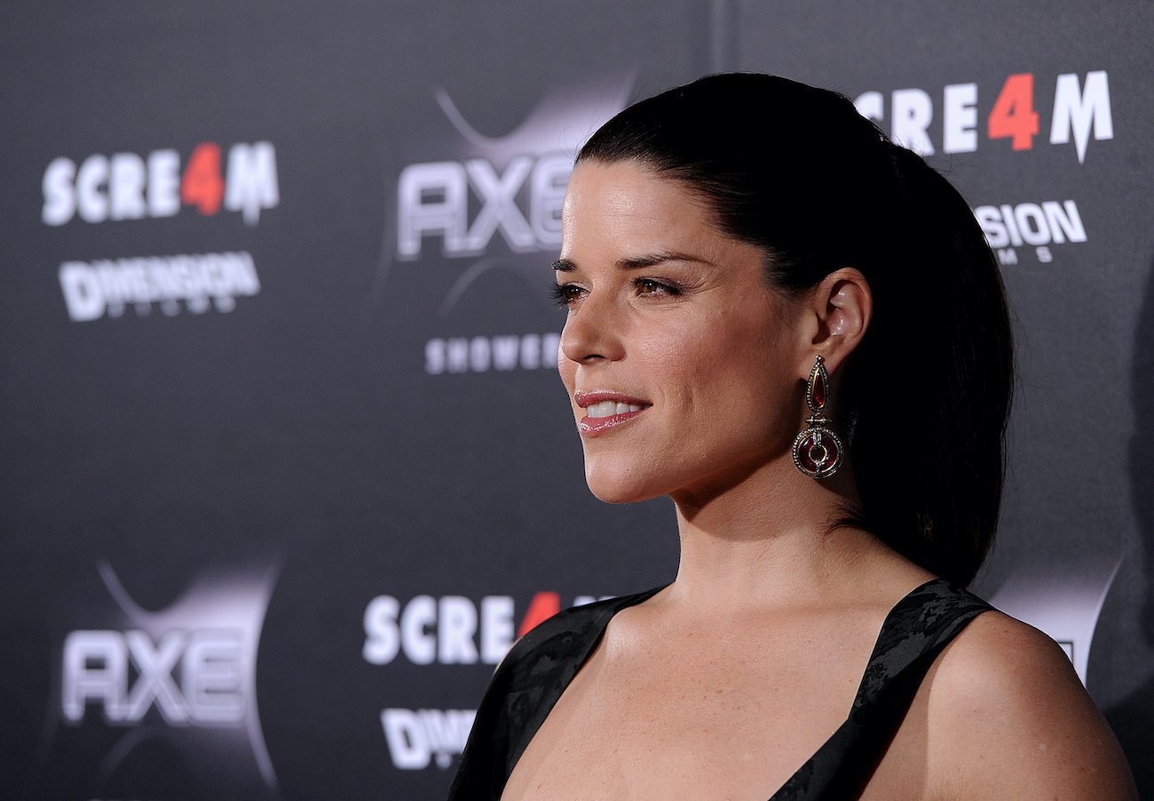 Neve Campbell, who plays Sidney Prescott, poses for a photo at the 'Scream 4' premiere
