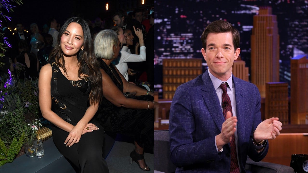 (L) Olivia Munn sitting in a black dress; (R) John Mulaney clapping in a blue suit