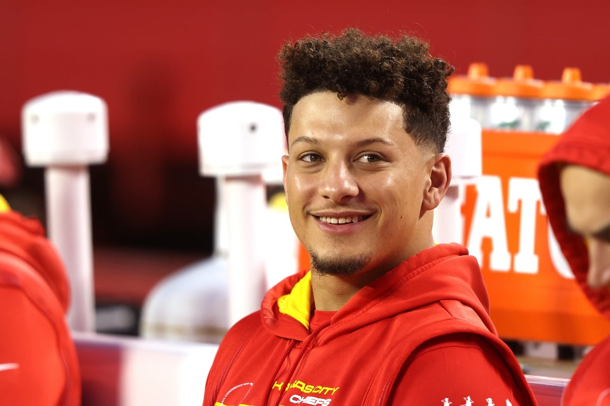 Patrick Mahomes smiling before a game against the Denver Broncos