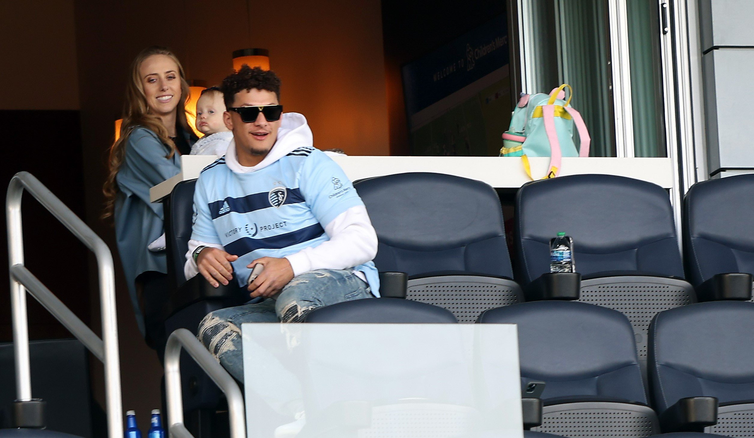 Patrick Mahomes with Brittany Matthews and their daughter, Sterling, watching a Major League Soccer playoff game