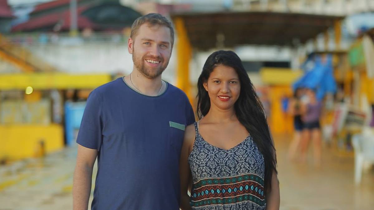 '90 Day Fiancé' stars Paul Staehle in a blue tshirt and Karine Martin in a patterned dress.