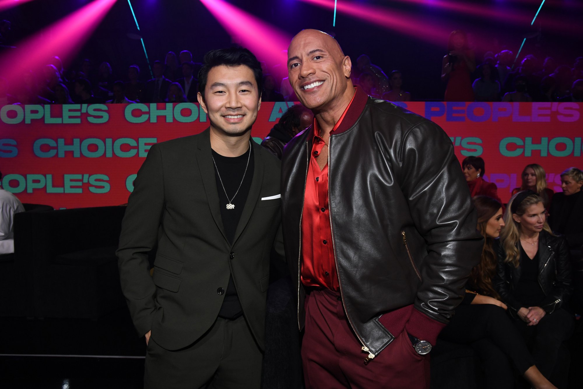 People's Choice Awards 2021 winners Simu Liu and Dwayne Johnson with their hand in their pockets