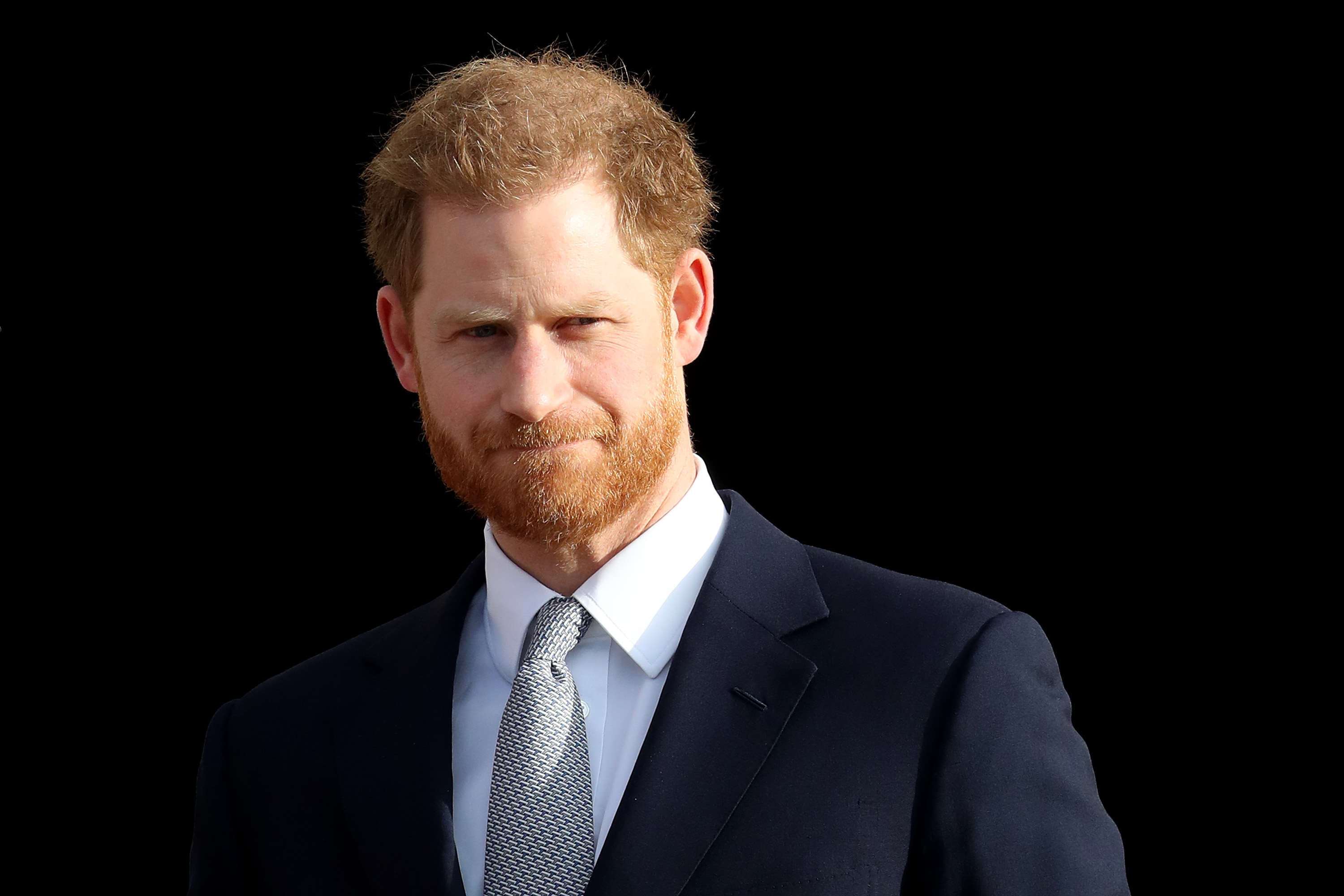 Photo of Prince Harry dressed in a suit as he hosts the Rugby League World Cup draws