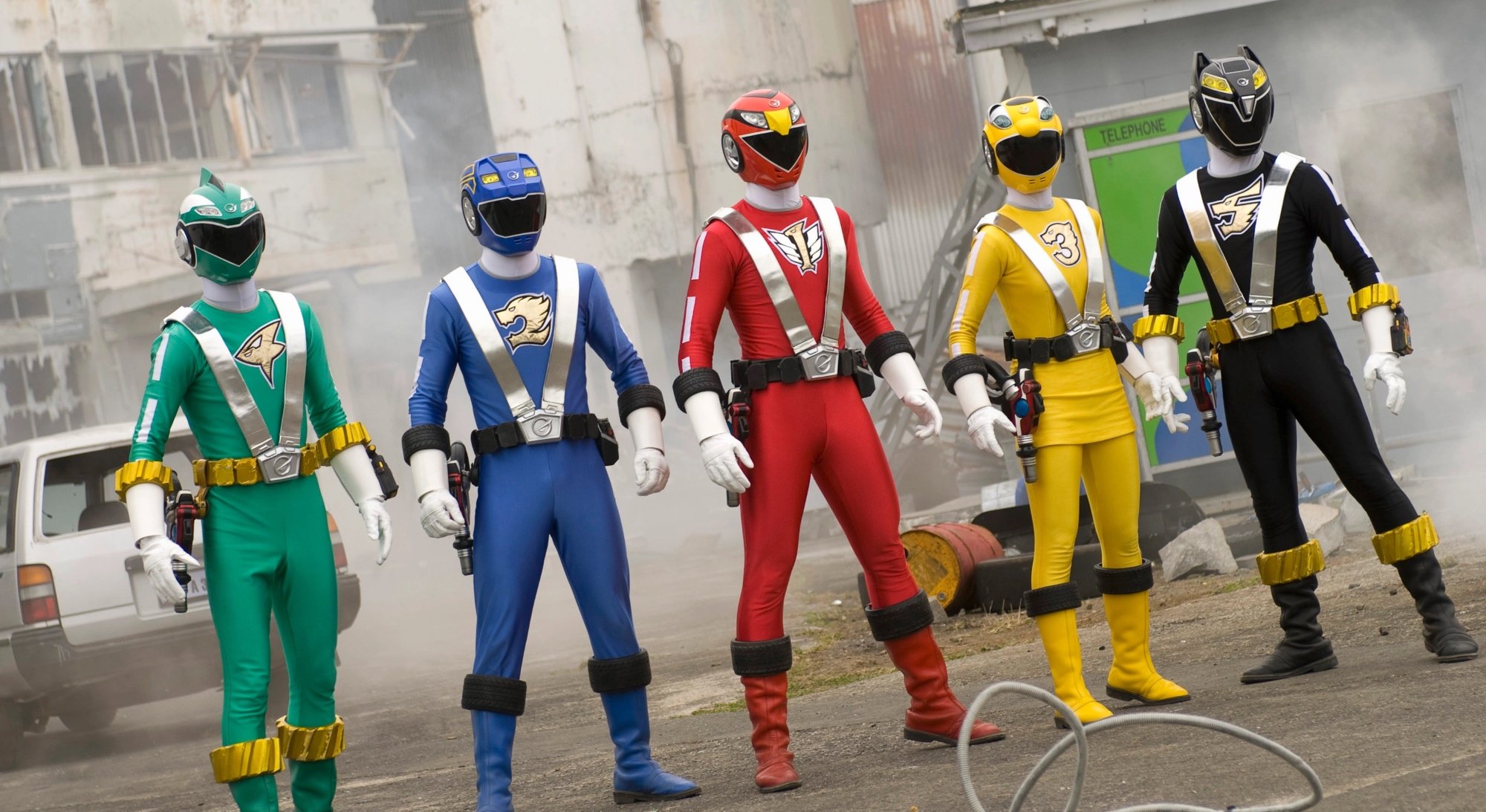 'Power Rangers RPM' characters in Ranger suits during battle.