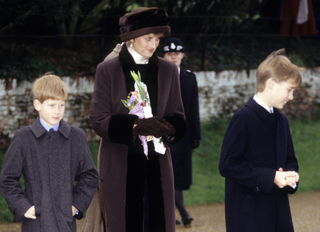 Prince Harry and Prince William walk next to Princess Diana on Christmas Day