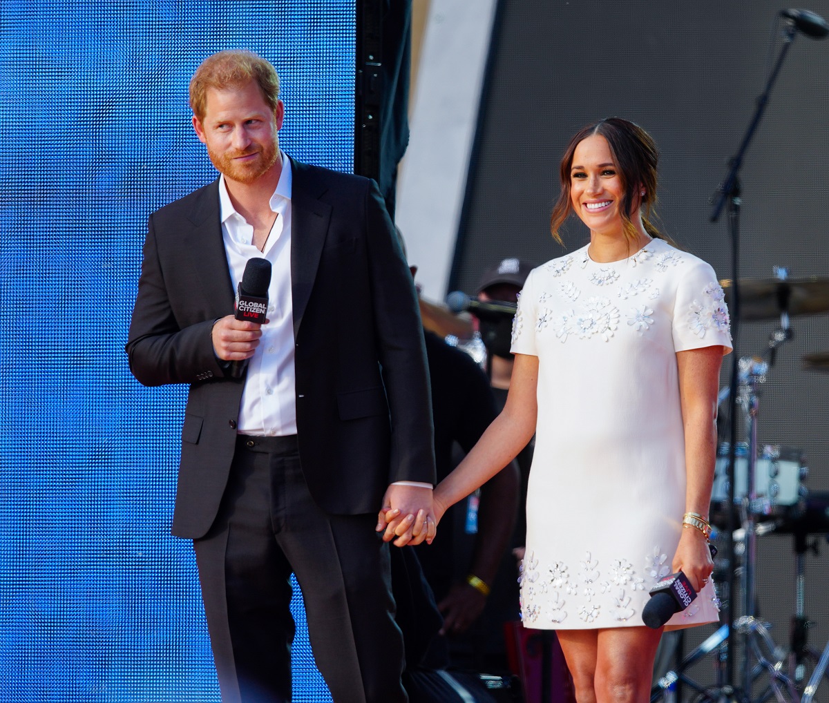 Prince Harry and Meghan Markle speaking on stage at Global Citizen Live