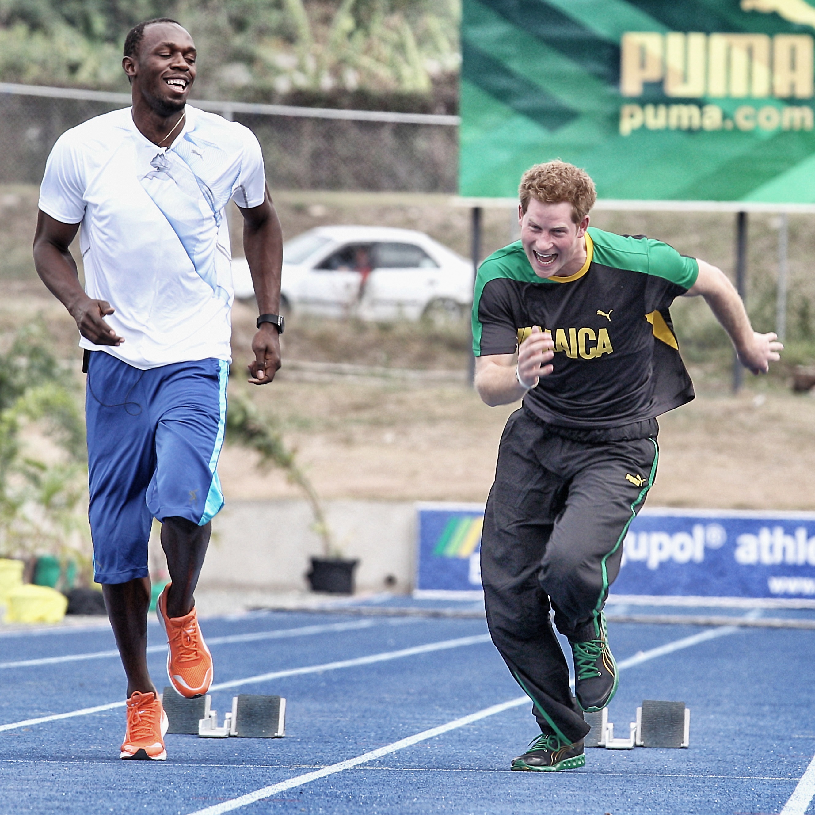 Prince Harry racing Usain Bolt on the Usain Bolt Track at the University of the West Indies