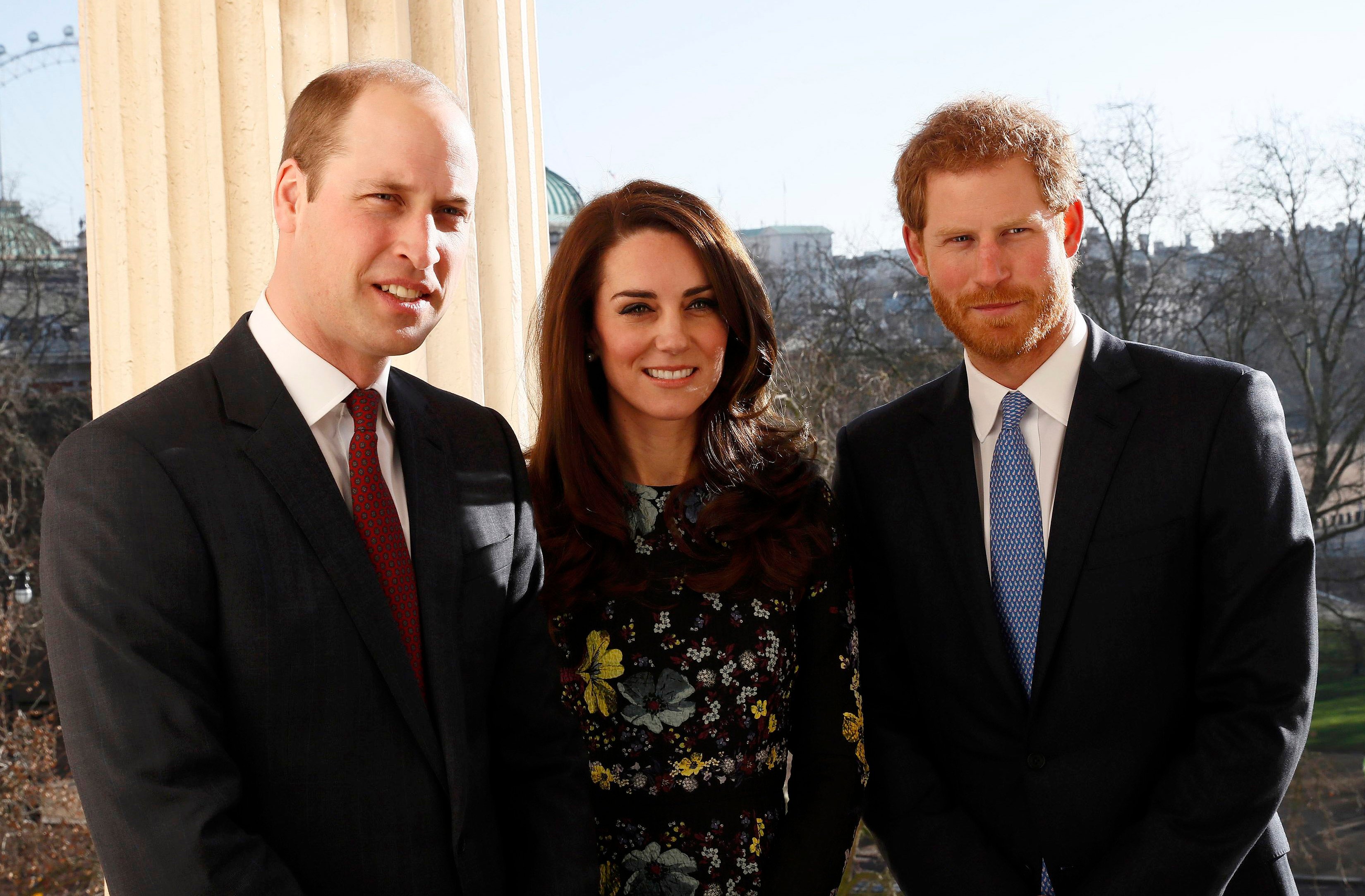 Prince William, Kate Middleton, and Prince Harry pose for photo during a Heads Together event