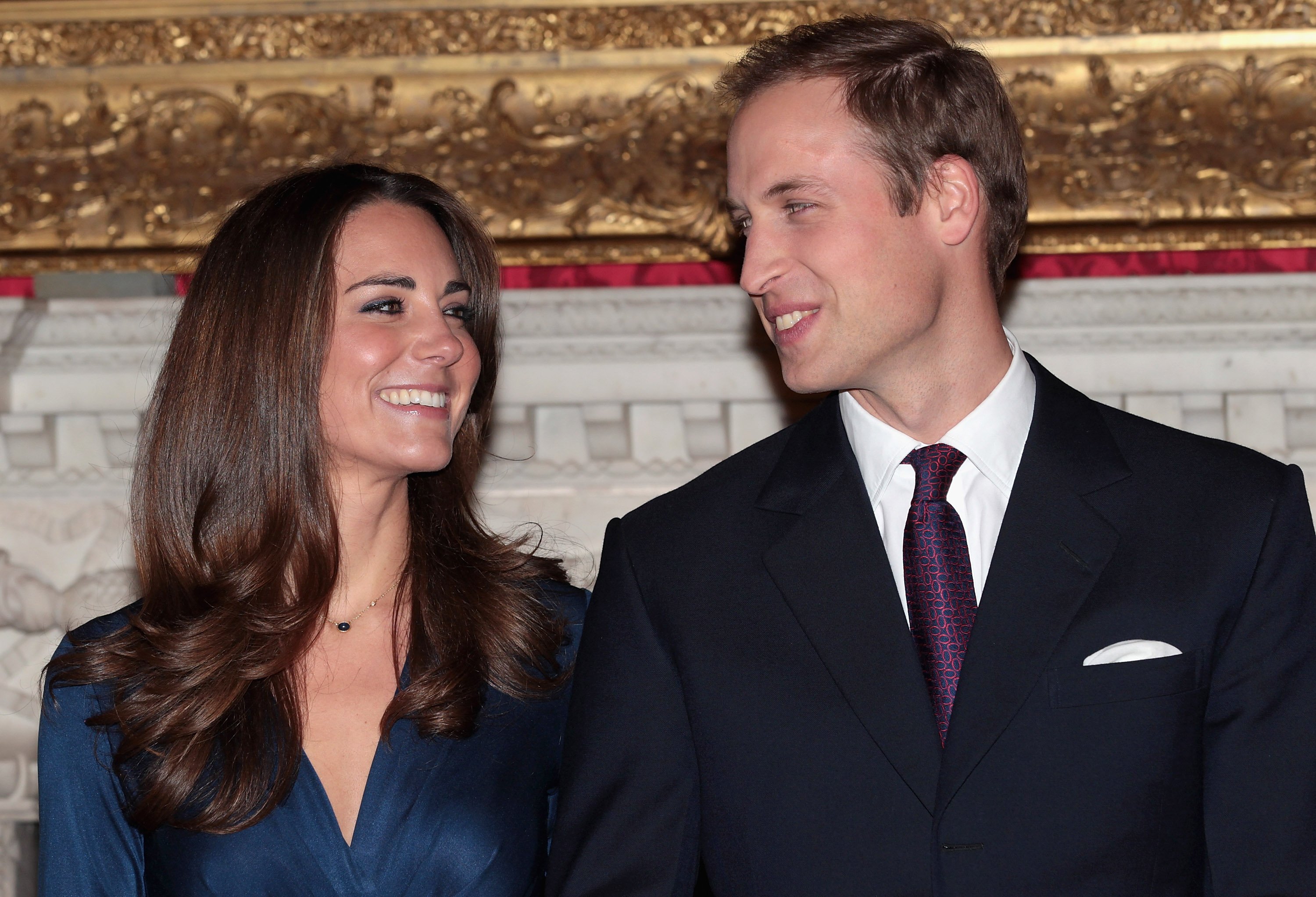 Prince William and Kate Middleton pose for photographs after announcing engagement