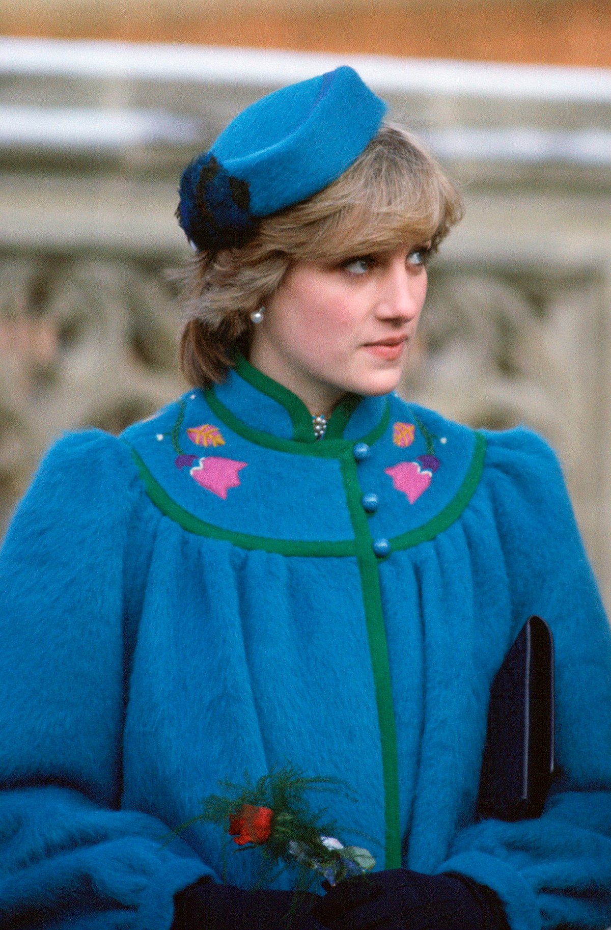 Princess Diana attends a service at S. George's Chapel, on Christmas day, December 25, 1981 in a blue overcoat with a matching pillbox hat