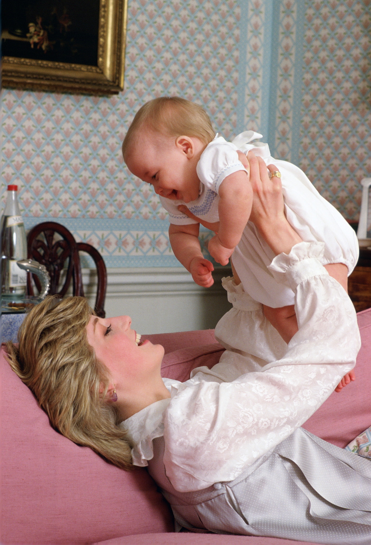 Princess Diana holding an infant Prince William