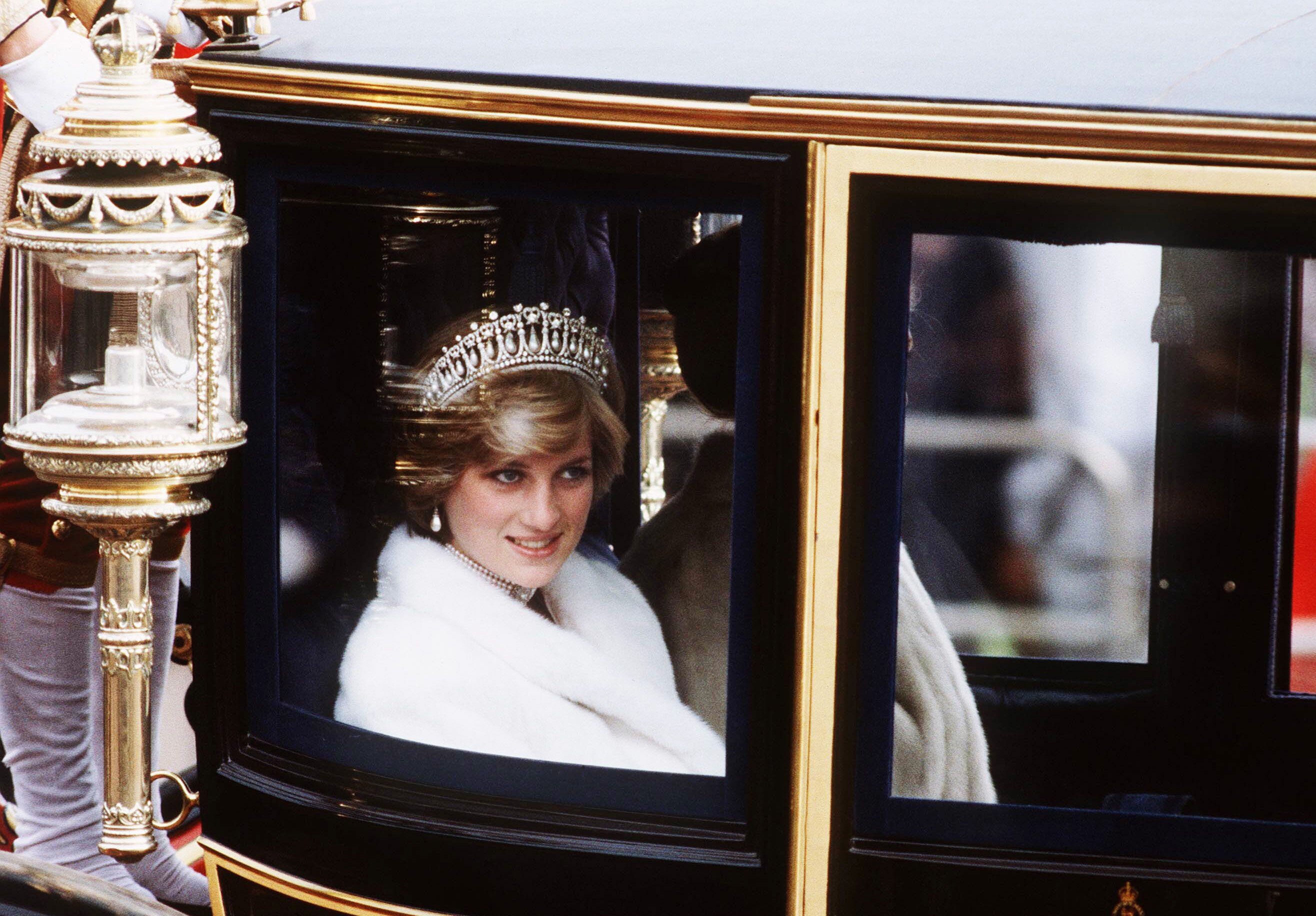 Princess Diana in a carriage on her way to the State Opening of Parliament in 1981