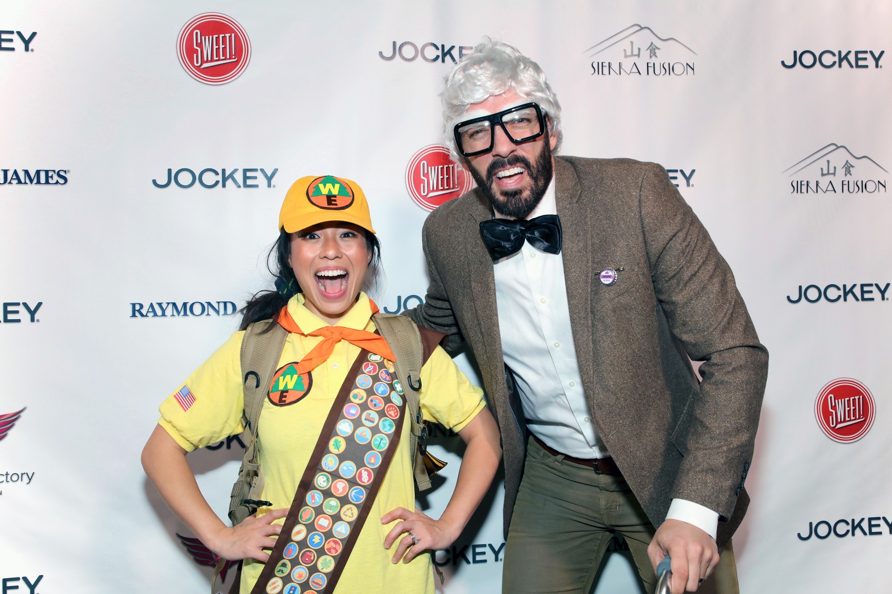 Property Brothers star Drew Scott, left, dressed in an Albert Einstein costume, and wife Linda Phan, left, dressed in a Girl Scout costume