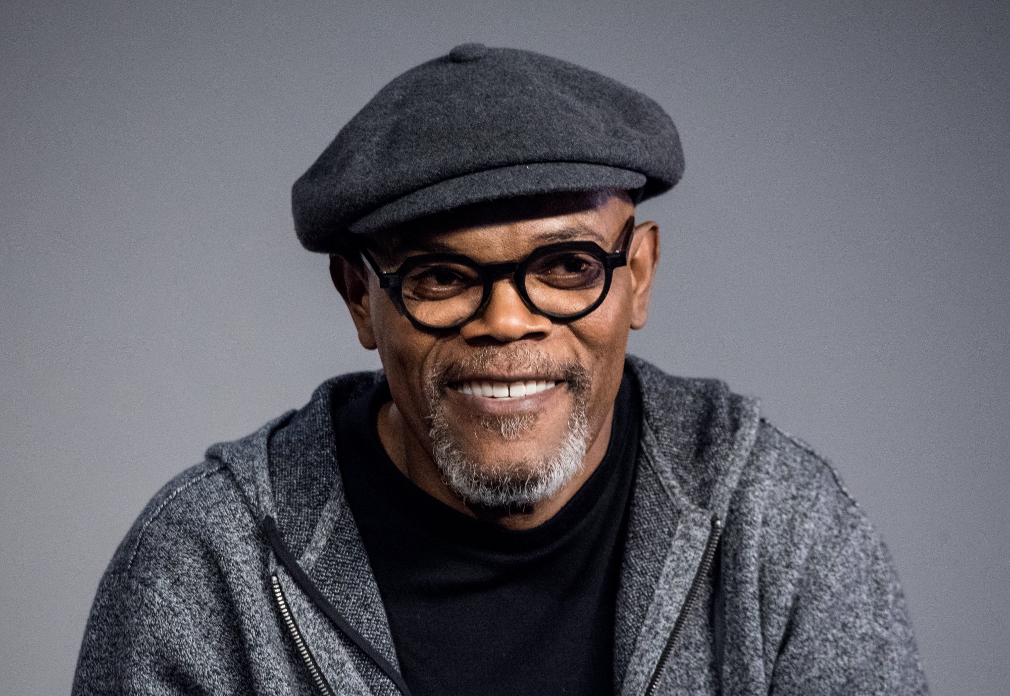 'Pulp Fiction' actor Samuel L. Jackson wearing a hat and a hoodie