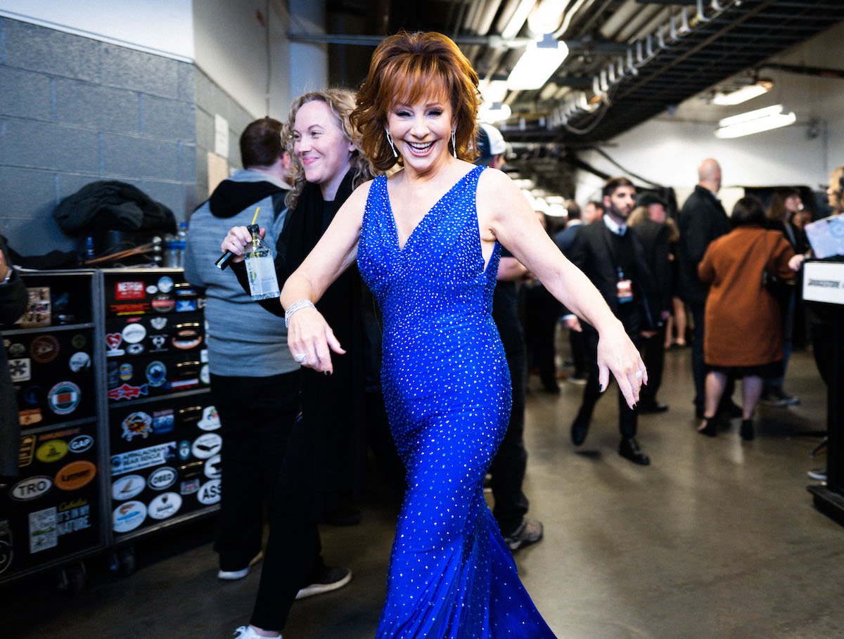 Reba McEntire greets the camera backstage at the 2019 CMA Awards