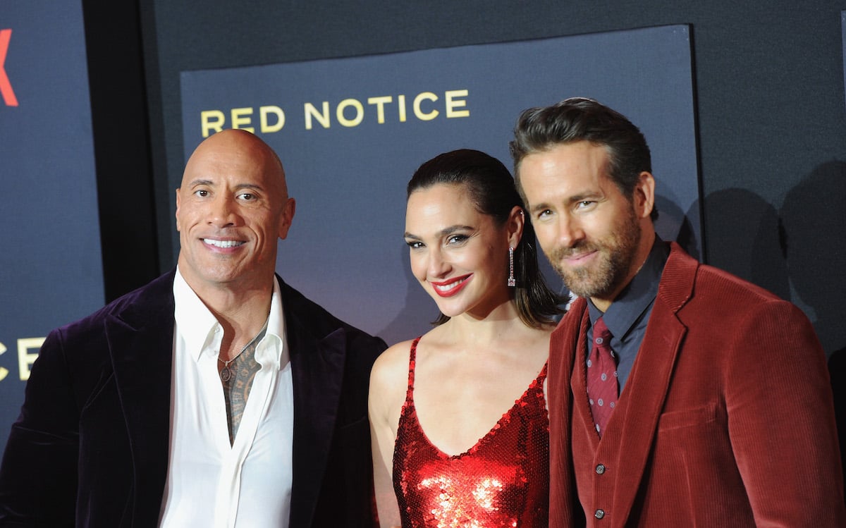 Red Notice stars Dwayne Johnson, Gal Gadot, and Ryan Reynolds arrive for the world premiere of the Netflix movie at L.A. Live on November 3, 2021, in Los Angeles, California