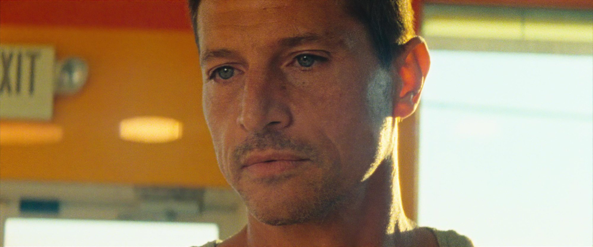 'Red Rocket' Simon Rex as Mikey Saber staring to the side