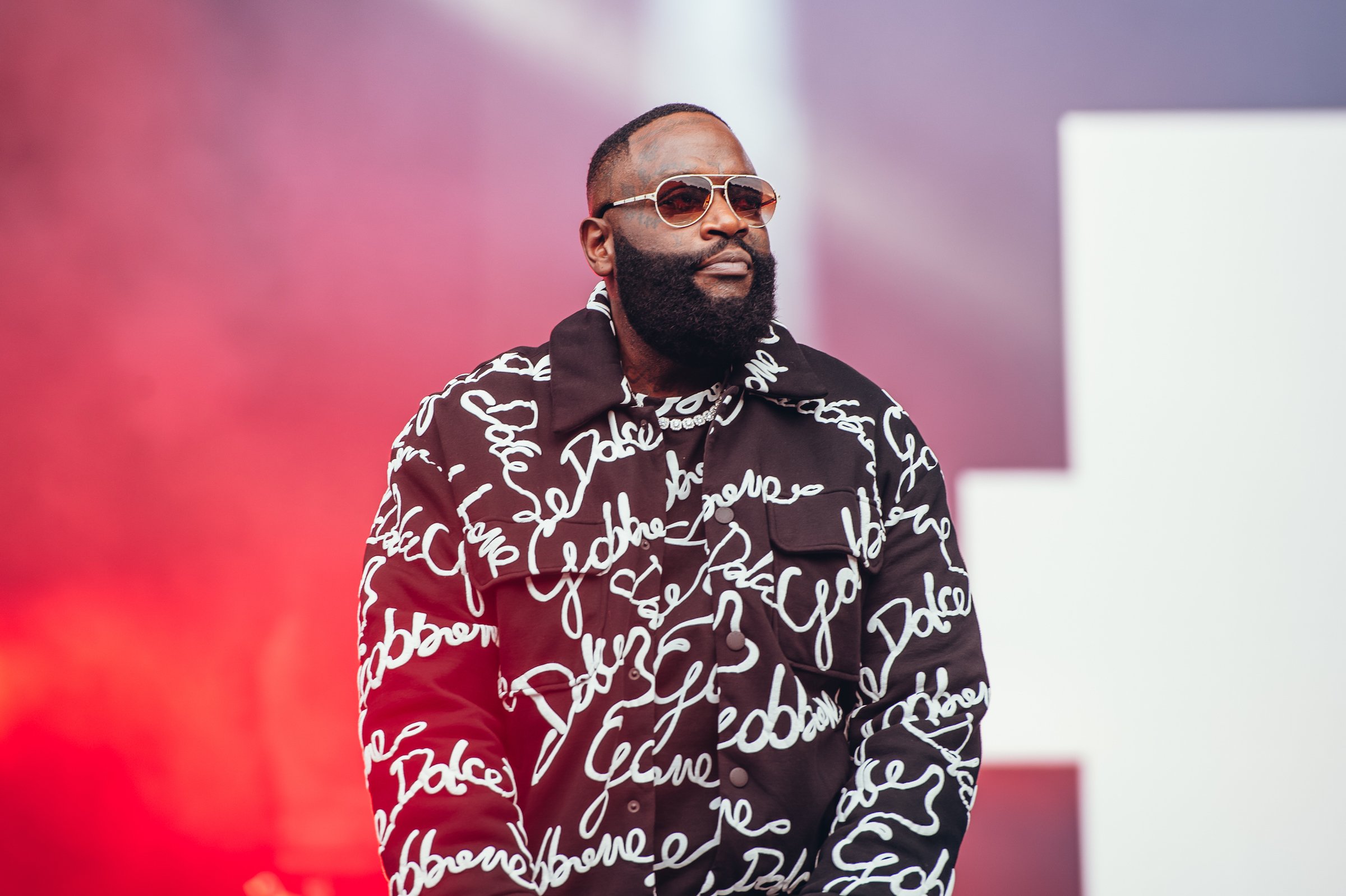 Rick Ross wearing a black and white jacket