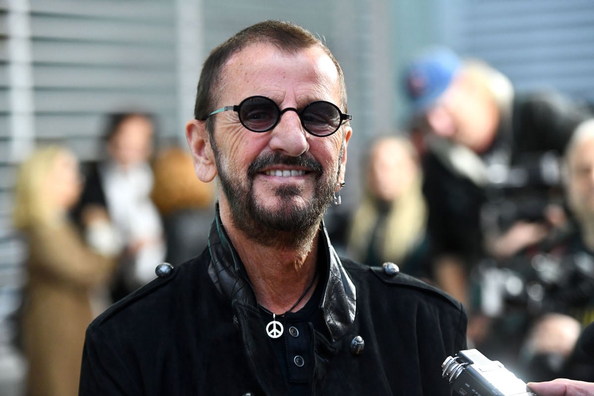 Ringo Starr smiling, wearing sunglasses