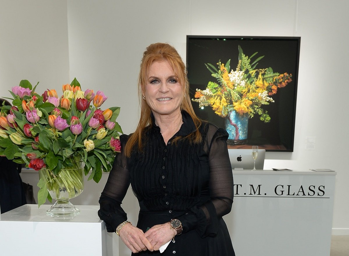 Sarah Ferguson smiling for a photo at the T.M. Glass Solo Exhibition