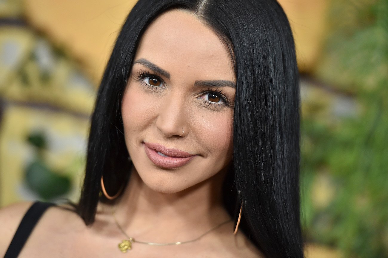 Scheana Shay with straight black hair, looking into the camerea