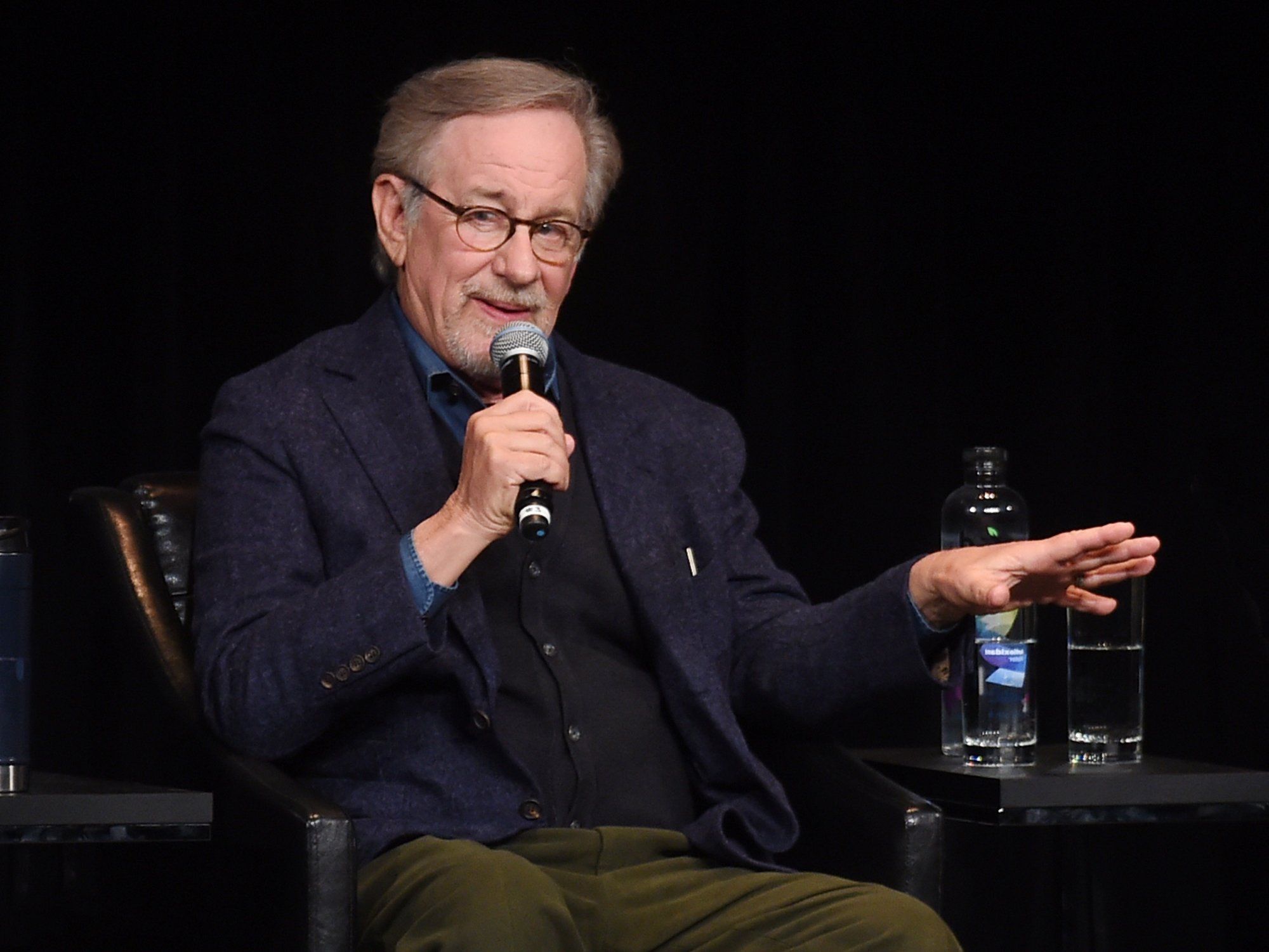 'Schindler's List' filmmaker Steven Spielberg speaking into a microphone